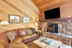 Mammoth Condo Rental Snowflower 37 - LR has Pellet Stove and Outside Deck Access